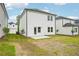 Exterior home view featuring a grass backyard and an installed patio at 2770 Aralynn Way, College Park, GA 30337