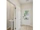 Welcoming foyer features a convenient powder room and a bright front door at 2770 Aralynn Way, College Park, GA 30337