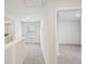 Upstairs hallway, with a view of the laundry area and a bedroom, and carpet flooring at 2770 Aralynn Way, College Park, GA 30337