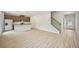 Open concept kitchen boasts granite countertops, stainless steel appliances, and a breakfast bar at 2770 Aralynn Way, College Park, GA 30337
