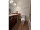 Classic bathroom featuring a vanity, commode, and a bathtub at 315 Seasons Pkwy, Norcross, GA 30093