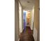 Hallway boasts wood floors and artwork enhancing the walls at 315 Seasons Pkwy, Norcross, GA 30093