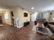 Spacious living room boasts hardwood floors, recessed lighting, neutral paint, and a comfortable seating area at 315 Seasons Pkwy, Norcross, GA 30093
