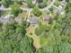 Aerial view of a home with a big, private, wooded lot at 3442 Inns Brook Way, Snellville, GA 30039