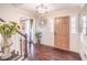 Elegant foyer with hardwood floors, stylish lighting, and decorative accents at 3442 Inns Brook Way, Snellville, GA 30039