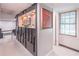 Hallway featuring a decorative partition, modern lighting, and window at 3442 Inns Brook Way, Snellville, GA 30039