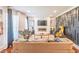 Stylish living area with modern decor, fireplace, and large windows for natural light at 3442 Inns Brook Way, Snellville, GA 30039