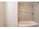 This bathroom features a tub and shower combination with stylish subway tile surround at 477 Victoria Rd, Woodstock, GA 30189
