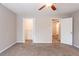Spacious bedroom offering two closets, carpeted floors and neutral decor at 477 Victoria Rd, Woodstock, GA 30189