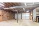 Spacious three car garage waiting for your vision at 477 Victoria Rd, Woodstock, GA 30189