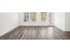 Bright living room with hardwood floors and plenty of natural light at 364 White Tail Rd, Stockbridge, GA 30253