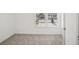 A bright bedroom featuring neutral carpet and large windows at 353 White Tail Rd, Stockbridge, GA 30253