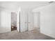 Bedroom showcasing neutral carpet with views to bathroom and other rooms, offering a bright and inviting atmosphere at 353 White Tail Rd, Stockbridge, GA 30253