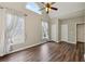 Bedroom featuring vaulted ceilings, many windows, and hardwood floors at 1780 Riverglen Dr, Suwanee, GA 30024