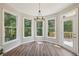 Sunlit breakfast nook with a large window and a view to the deck at 1780 Riverglen Dr, Suwanee, GA 30024