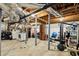 Unfinished basement with exposed pipes, a workbench, and exercise equipment at 2506 Parkdale Ne Pl, Atlanta, GA 30305