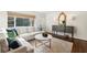 Cozy living room with a neutral color palette, complemented by hardwood floors and natural light at 2506 Parkdale Ne Pl, Atlanta, GA 30305