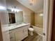 Bathroom features a new vanity with stone top, and tiled bathtub at 5806 Par Four Ct, Lithonia, GA 30038