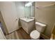 Updated bathroom with new vanity, mirror, and modern fixtures at 5806 Par Four Ct, Lithonia, GA 30038