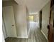 Inviting entryway leading into a living room with hardwood floors at 5806 Par Four Ct, Lithonia, GA 30038
