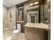 Well-lit bathroom with a glass shower, sleek vanity, and modern fixtures at 904 Lenox Ne Blvd, Atlanta, GA 30324