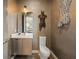 Modern powder room with unique artistic elements and vanity at 904 Lenox Ne Blvd, Atlanta, GA 30324