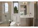 Modern bathroom with a glass-enclosed shower and sleek vanity at 904 Lenox Ne Blvd, Atlanta, GA 30324