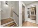 Hallway featuring stairs and a doorway to a bathroom at 904 Lenox Ne Blvd, Atlanta, GA 30324