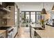 Modern kitchen with stainless steel appliances, sleek cabinetry, and bright natural light at 904 Lenox Ne Blvd, Atlanta, GA 30324