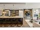 Modern kitchen and living area with stainless appliances, large island, and stylish decor at 904 Lenox Ne Blvd, Atlanta, GA 30324