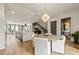 Open concept with dining area adjacent to a modern kitchen featuring an island with bar seating at 904 Lenox Ne Blvd, Atlanta, GA 30324