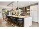 Gourmet kitchen featuring an oversized island with seating and pendant lighting at 904 Lenox Ne Blvd, Atlanta, GA 30324