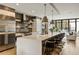 Spacious kitchen with large island, stainless steel appliances, bar seating and an open floor plan at 904 Lenox Ne Blvd, Atlanta, GA 30324