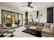 Cozy living room with stylish decor and access to the patio at 904 Lenox Ne Blvd, Atlanta, GA 30324