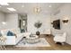 Inviting living room with hardwood floors, designer furniture, and a modern wet bar at 904 Lenox Ne Blvd, Atlanta, GA 30324