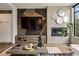 Modern living room with a fireplace, designer wall, and stylish decor at 904 Lenox Ne Blvd, Atlanta, GA 30324