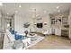 Bright living room features a wet bar, modern decor, and hardwood floors at 904 Lenox Ne Blvd, Atlanta, GA 30324