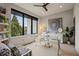 Bright home office featuring a large window with treetop views and a glass desk at 904 Lenox Ne Blvd, Atlanta, GA 30324