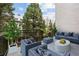 Relaxing patio features cozy furniture, a modern coffee table, and greenery, ideal for entertaining or unwinding outdoors at 904 Lenox Ne Blvd, Atlanta, GA 30324
