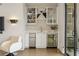 A modern wet bar features wine storage, cabinets, a stainless-steel beverage cooler, and a sink at 904 Lenox Ne Blvd, Atlanta, GA 30324