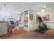 Finished basement featuring exercise equipment, built-in bookshelves, and an open floor plan at 1835 Berkeley Ne Mews, Atlanta, GA 30329
