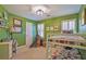 A bedroom with bunkbeds, teepee, and a workspace at 1835 Berkeley Ne Mews, Atlanta, GA 30329