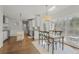 Bright and airy kitchen and breakfast nook area with large windows at 1835 Berkeley Ne Mews, Atlanta, GA 30329