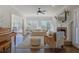 Bright living room with fireplace, large windows, and hardwood floors, perfect for entertaining guests or relaxing at 1835 Berkeley Ne Mews, Atlanta, GA 30329