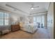 This main bedroom features a tray ceiling, neutral decor, and a cozy bay window seating area at 1835 Berkeley Ne Mews, Atlanta, GA 30329