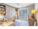 An office with a built-in bookcase, lots of natural light and dual work stations at 1835 Berkeley Ne Mews, Atlanta, GA 30329
