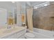 Bright bathroom featuring a tub and shower combination and vanity with sink at 340 Marietta Walk Ln, Marietta, GA 30064
