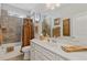 Bathroom featuring double vanity, shower and bath tub, and decorative accents at 340 Marietta Walk Ln, Marietta, GA 30064