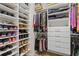Walk-in closet featuring shelves for shoes, clothes and drawers for folded items at 340 Marietta Walk Ln, Marietta, GA 30064