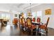Formal dining room with seating for six, hardwood floors, and elegant decor at 340 Marietta Walk Ln, Marietta, GA 30064